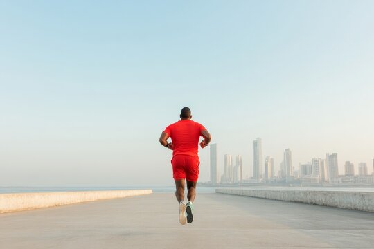 Urban Fitness Progress Diverse Morning Joggers on Indian Riverside - Athletic Gear and Motivation in Modern Cityscape for Wellness and Outdoor Lifestyle Retail