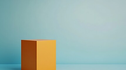 Fototapeta premium Orange Cube on Light Blue Background Minimalist Scene