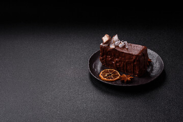 Piece of sweet chocolate bounty cake with coconut flakes and sponge