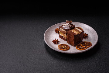 Piece of sweet chocolate bounty cake with coconut flakes and sponge