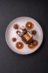 Piece of sweet chocolate bounty cake with coconut flakes and sponge