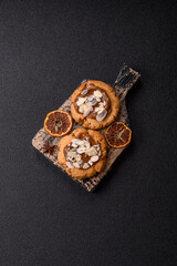 Round cookies with nuts and chocolate butter