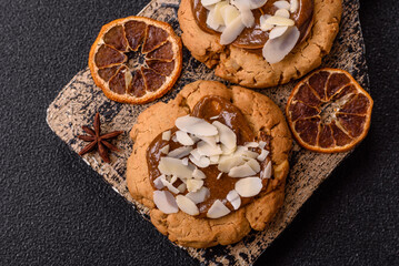 Round cookies with nuts and chocolate butter