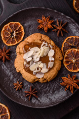 Round cookies with nuts and chocolate butter