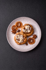 Round cookies with nuts and chocolate butter