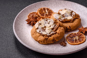 Round cookies with nuts and chocolate butter