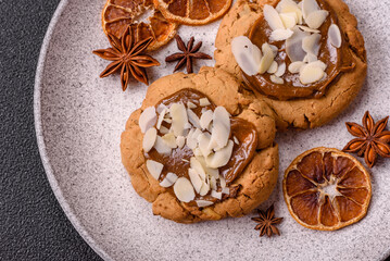 Round cookies with nuts and chocolate butter
