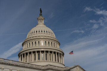 United States Capitol Building  Against Blue Sky Background