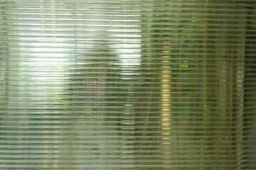 A Close up of corrugated glass texture with reflected,modern home decor,stylish home decor,Creative...
