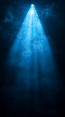 A blue isolated spotlight on black background. Minimalist style blue spotlight rays on black background.