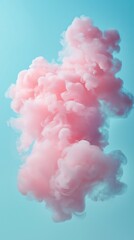 Fototapeta premium Dreamy pink cloud of smoke floating against a pastel blue background