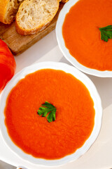 Famous vegetables soup from Cordoba, Andalusia salmorejo served cold in restaurant for lunch as starter dish close up