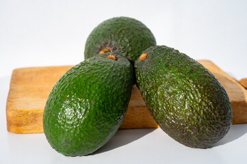 Green ripe avocado from organic avocado plantation - healthy food