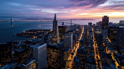 A city skyline at night with a beautiful sunset in the background
