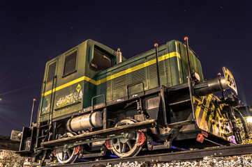 photograph of an old locomotive on a track