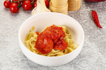 Italian pasta pappardelle with chorizo