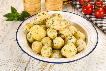 Young boiled mini potato with dill