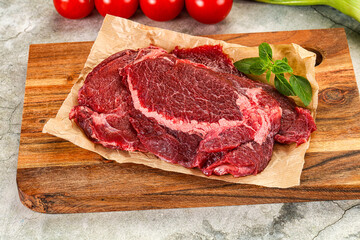 Raw beef cheeks cut for cooking