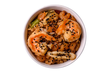 Rice with shrimps and seafood, vegetables, spices and soy sauce