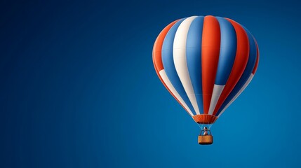 Obraz premium Hot Air Balloon Soaring: A vibrant red, white, and blue hot air balloon ascends against a clear blue sky, symbolizing dreams taking flight, exploration, and the pursuit of adventure.