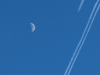 Chemtrails and Half Moon in the Sky – Airplane Contrails or Something More?