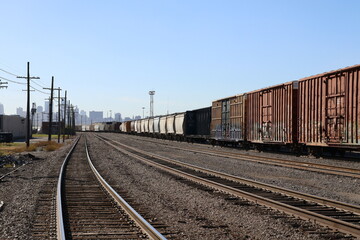 Obraz premium train on railway in a local neighborhood.