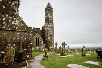 The historic cemetery at Rock of Cashel in County Tipperary, Ireland, featuring a medieval round...