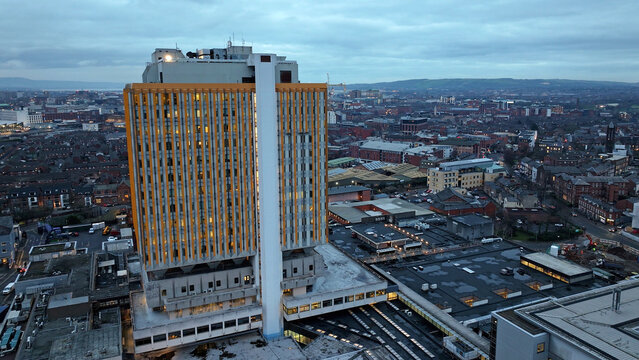 Aerial view of Belfast City Hospital and Macmillan Cancer Information Support Centre Belfast City Northern Ireland at night 03-01-25