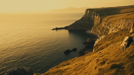 Golden Sunset Over Dramatic Coastal Cliffs and Ocean