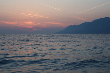 Seascape clouds at sunset over the sea on the beach
