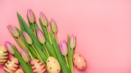 Easter background with eggs and tulips, copy space, top view