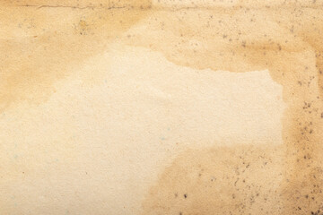 Yellowed book page with dirty stains and mold abstract textured vintage paper