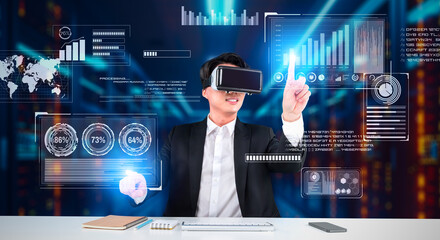 Smart project manager looking and holding business data and checking financial chart. Smart business man wearing augmented reality goggles by using artificial intelligence planning plan. Ingenuity.