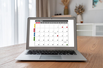 Fototapeta premium Calendar on computer software application for modish schedule planning for personal organizer and online business