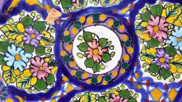 A blue and white plate with flowers on it