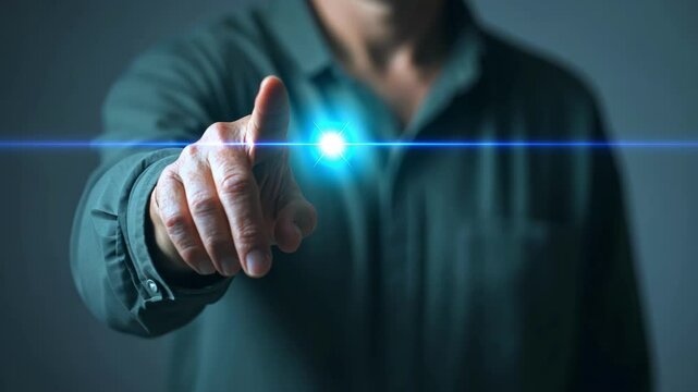 A man is pointing at a glowing blue button. Concept of excitement and anticipation, as if the button is a gateway to something new or important