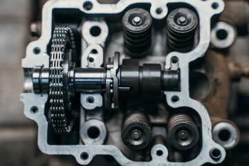 A Detailed CloseUp View of Engine Components Specifically Camshaft and Valve Lifters