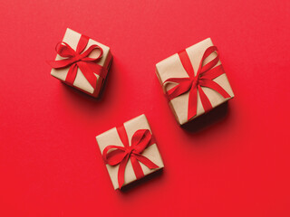 Valentine day on red background with gift boxs