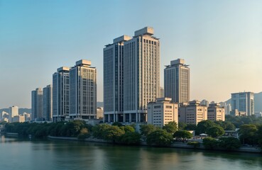 Fototapeta premium Morning cityscape view of Yeouido Seoul with skyscrapers along Han River. Modern architecture, business center with high rise buildings. Calm river water reflects buildings. Green trees lining