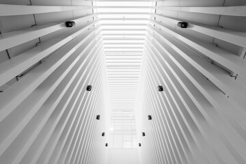 Striking photo of architectural figures featuring white metal structures and geometric shapes, highlighting modern design, clean lines, and innovative urban aesthetics