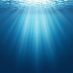 the sun's rays shine into the depths of the ocean, sunlight underwater, impressive seascape, beautiful and calm blue water surface, beautiful nature as a background