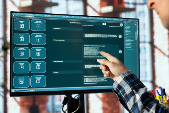 Freelancer in home office uses AI GPT trained on vast amounts of textual data to understand and produce natural sounding human language. Teleworker uses finetuned LLM powered chatbot
