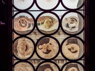 A window with a stained glass design. Old style look.