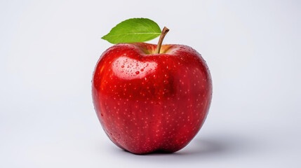 Fresh red apple on a clean white backdrop, showcasing its vibrant color and shiny surface. Perfect for healthy snacking.