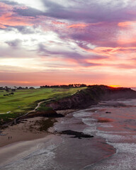 Golf course and beach headland at sunset. Long Reef beach, Sydney