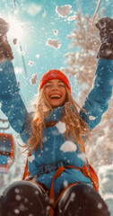 Joyful girl enjoying a snowy day on the ski slopes, celebrating with laughter and snowflakes in the air under a bright sky