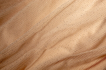 Concept with waves champagne mesh fabric. Retro fashion aesthetic. Can use as wedding background. Luxurious background design