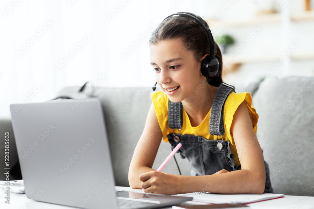 Poster little female student having video conference e-learning with teacher and classmates on computer in 