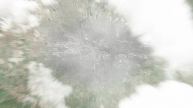 Earth zoom in from space to Eugene, Oregon, USA. Followed by zoom out through clouds and atmosphere into space. Satellite view. Travel intro. Images from NASA