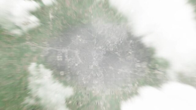 Earth zoom in from space to Ann Arbor, Michigan, USA. Followed by zoom out through clouds and atmosphere into space. Satellite view. Travel intro. Images from NASA